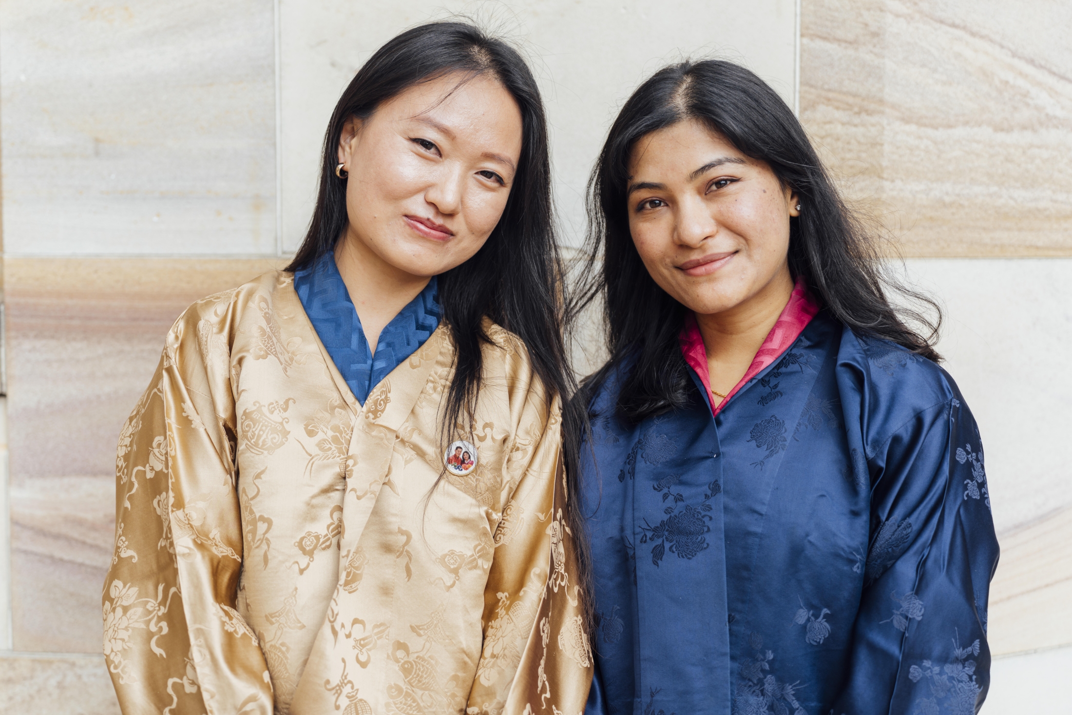 Tashi (left) with scholar Aruna Sinchuri (right) from Bhutan pictured in Brisbane.